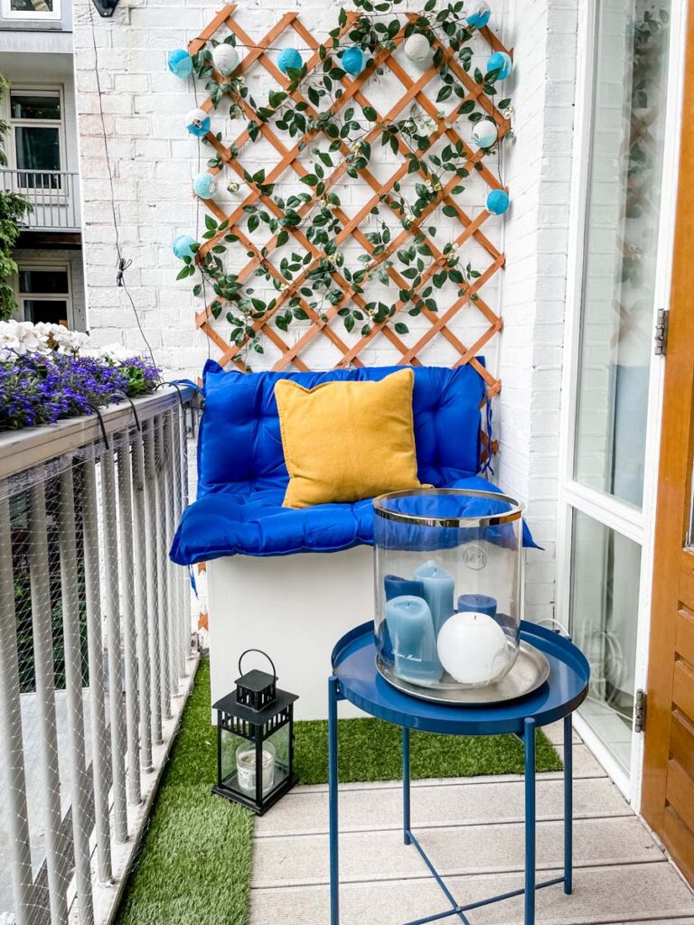 Balcony with blue couch