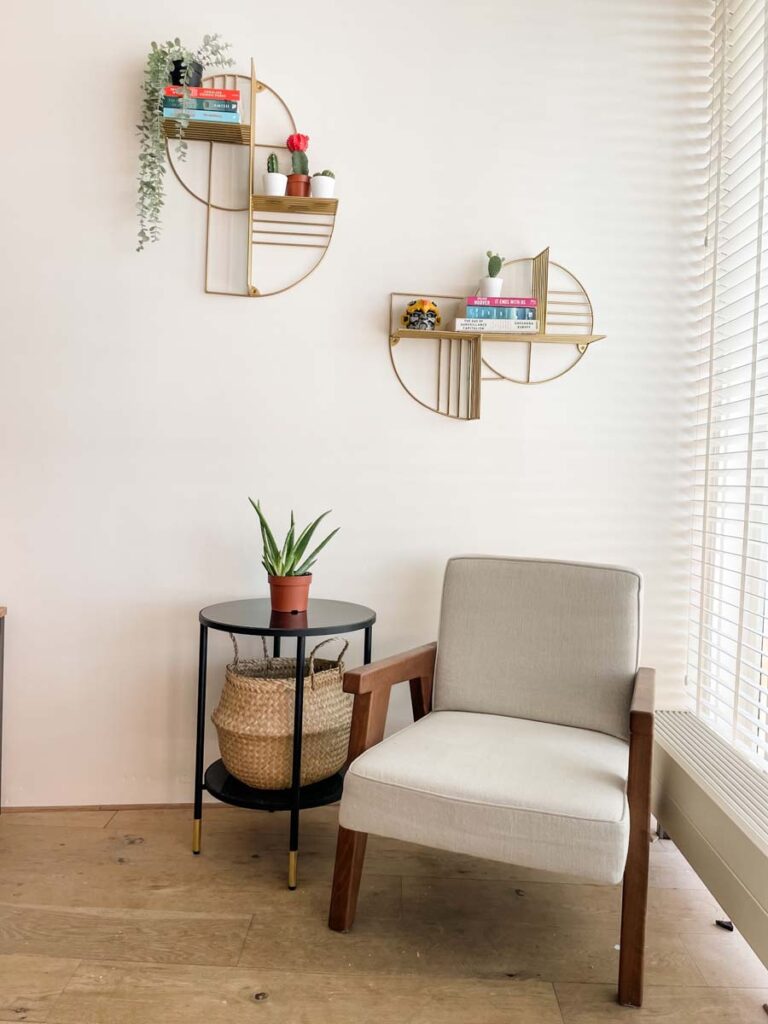 Armchair with floating bookshelf