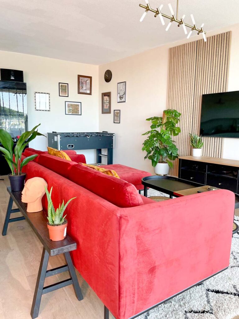 Livingroom with red velvet sofa