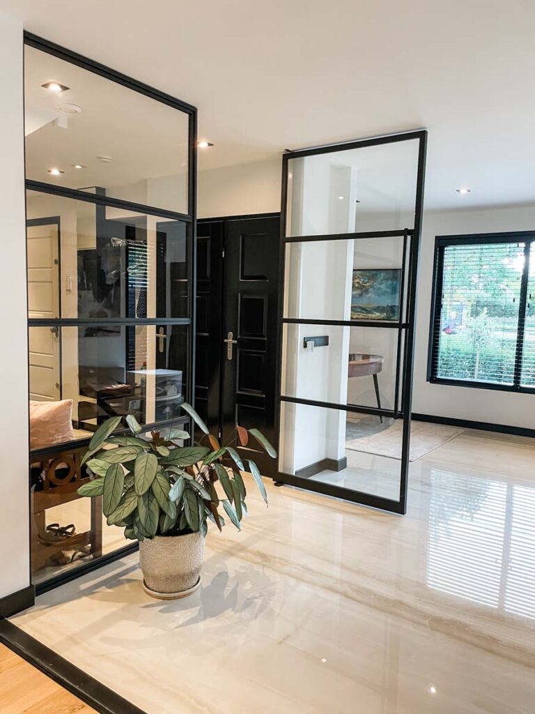 Steal and glass doors with marble floor